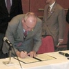 Dr. J. Van Goethem sign the MoU